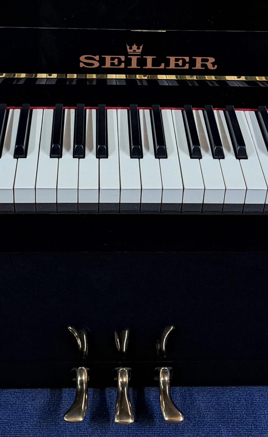 Seiler 116 upright Piano in black – Gallery image – Roberts Pianos Oxford