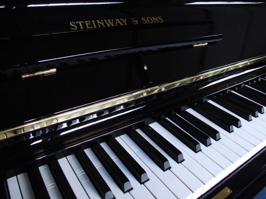 Steinway E upright Piano in black polyester – Gallery image – Roberts Pianos Oxford