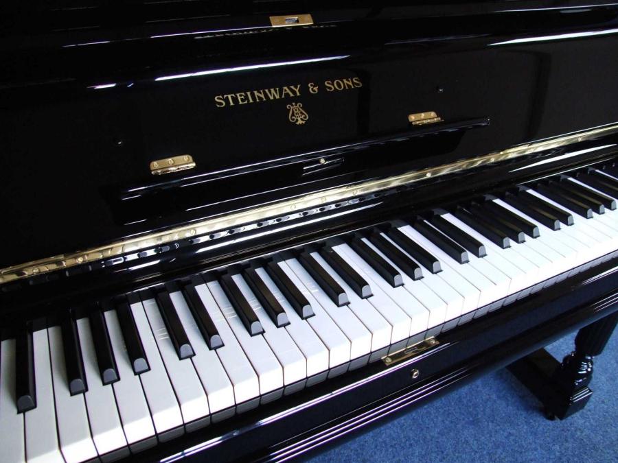 Steinway E upright Piano in black polyester – Gallery image – Roberts Pianos Oxford
