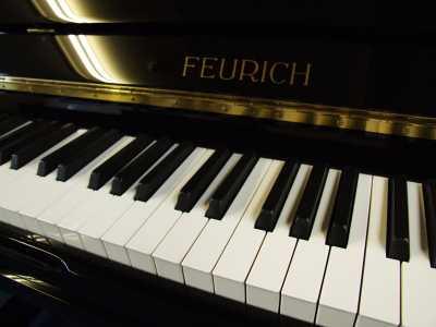 Feurich 133 upright Piano in Black Polyester – Gallery image – Roberts Pianos Oxford