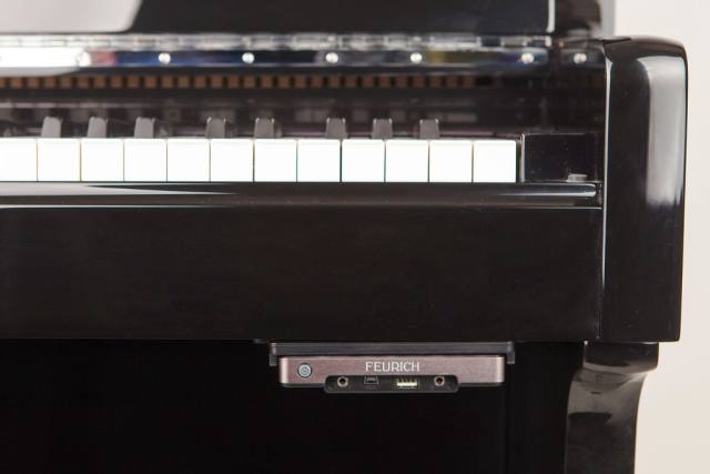 Feurich 122 Silent System upright Piano in bright black – Inventory thumbnail – Roberts Pianos Oxford