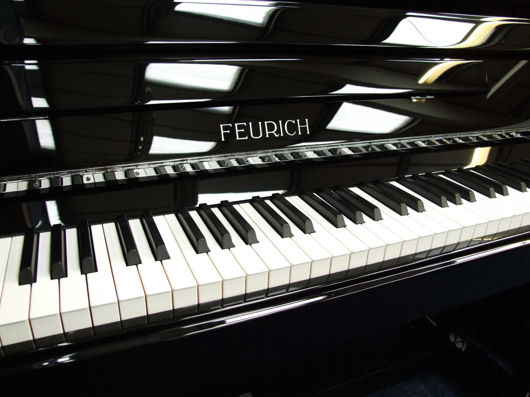 Feurich 122 upright Piano in gloss black – Gallery image – Roberts Pianos Oxford