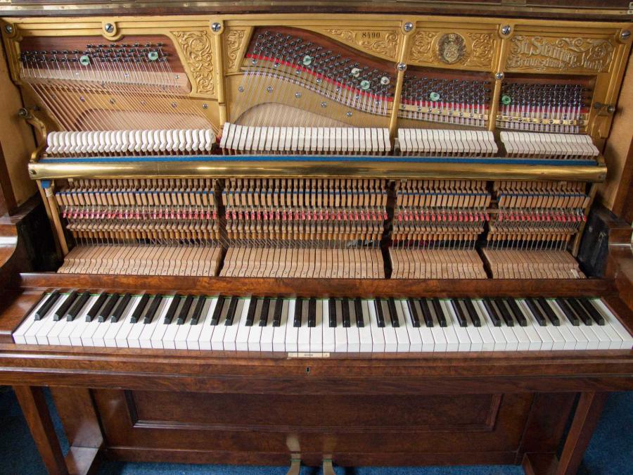 Grotrian Steinweg upright Piano in walnut – Gallery image – Roberts Pianos Oxford