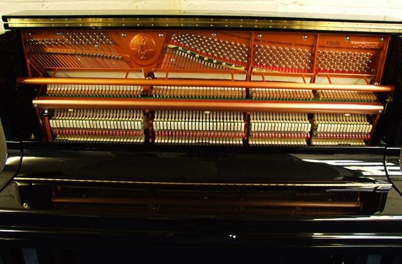Feurich 133 upright Piano in Black Polyester – Gallery image – Roberts Pianos Oxford