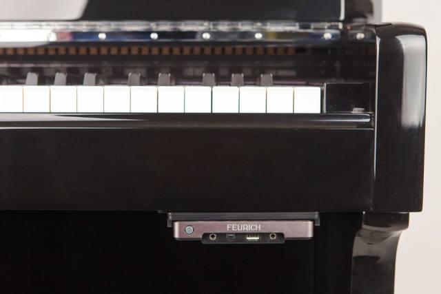Feurich 122 Silent System upright Piano in bright black – Inventory thumbnail – Roberts Pianos Oxford