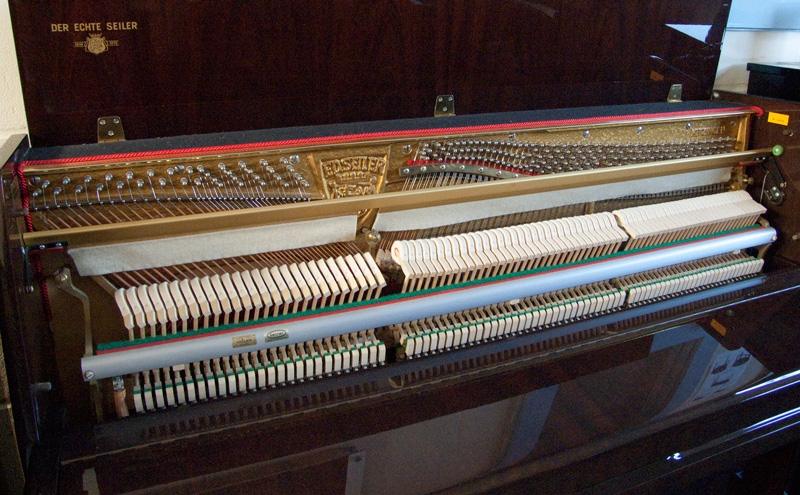 Seiler 116 upright Piano in bright walnut – Gallery image – Roberts Pianos Oxford