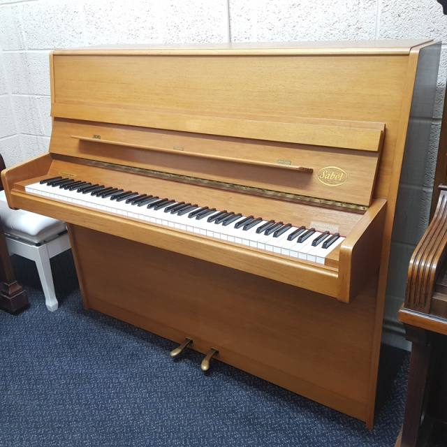 Sabel 118 upright Piano in light satin walnut – Inventory thumbnail – Roberts Pianos Oxford