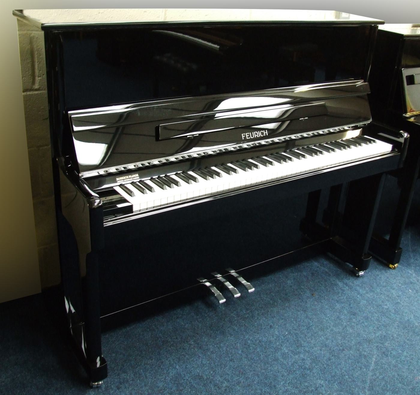 Feurich 122 upright Piano in black – Featured image – Roberts Pianos Oxford