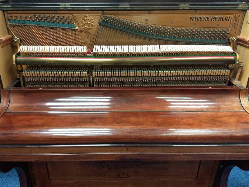 Biese upright Piano in Rosewood – Gallery image – Roberts Pianos Oxford