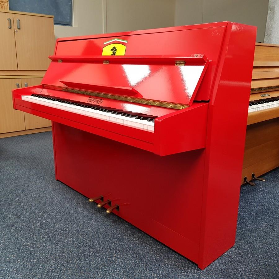 Ferrari Red 107cm upright Piano in Ferrari red – Gallery image – Roberts Pianos Oxford