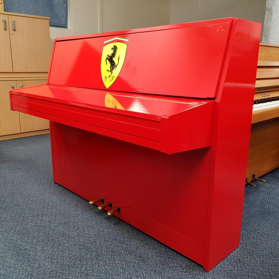 Ferrari Red 107cm upright Piano in Ferrari red – Gallery image – Roberts Pianos Oxford