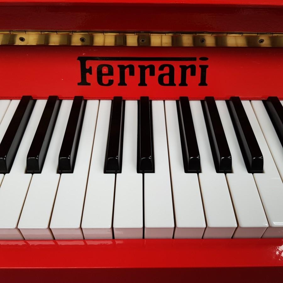Ferrari Red 107cm upright Piano in Ferrari red – Gallery image – Roberts Pianos Oxford