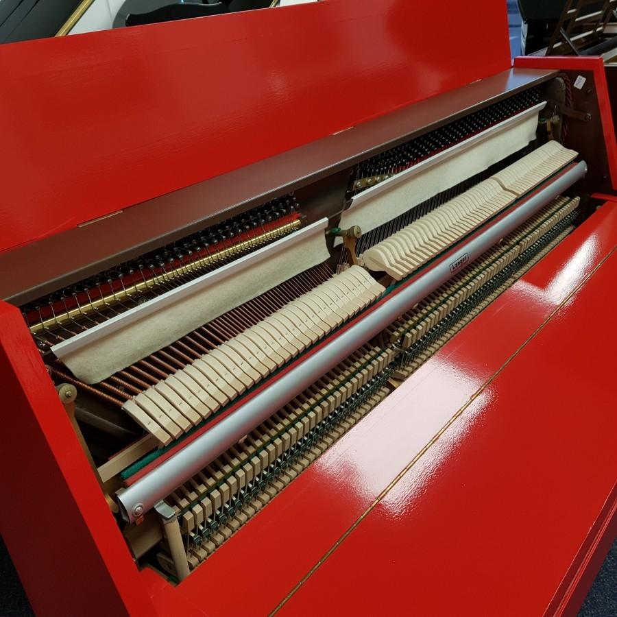 Ferrari Red 107cm upright Piano in Ferrari red – Gallery image – Roberts Pianos Oxford