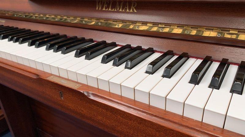 Welmar upright Piano in walnut – Gallery image – Roberts Pianos Oxford