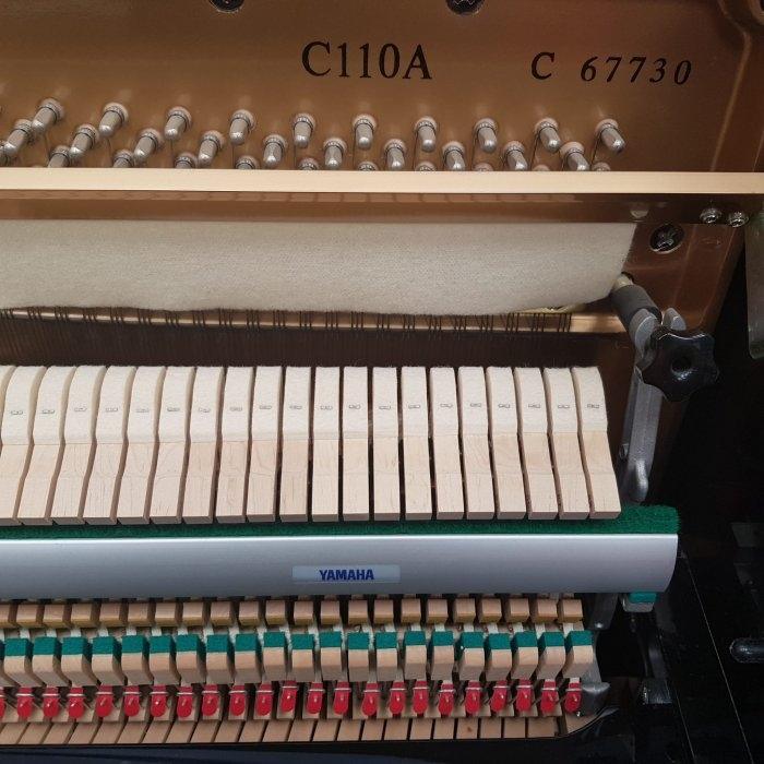 Yamaha C110A upright Piano in Bright black – Gallery image – Roberts Pianos Oxford