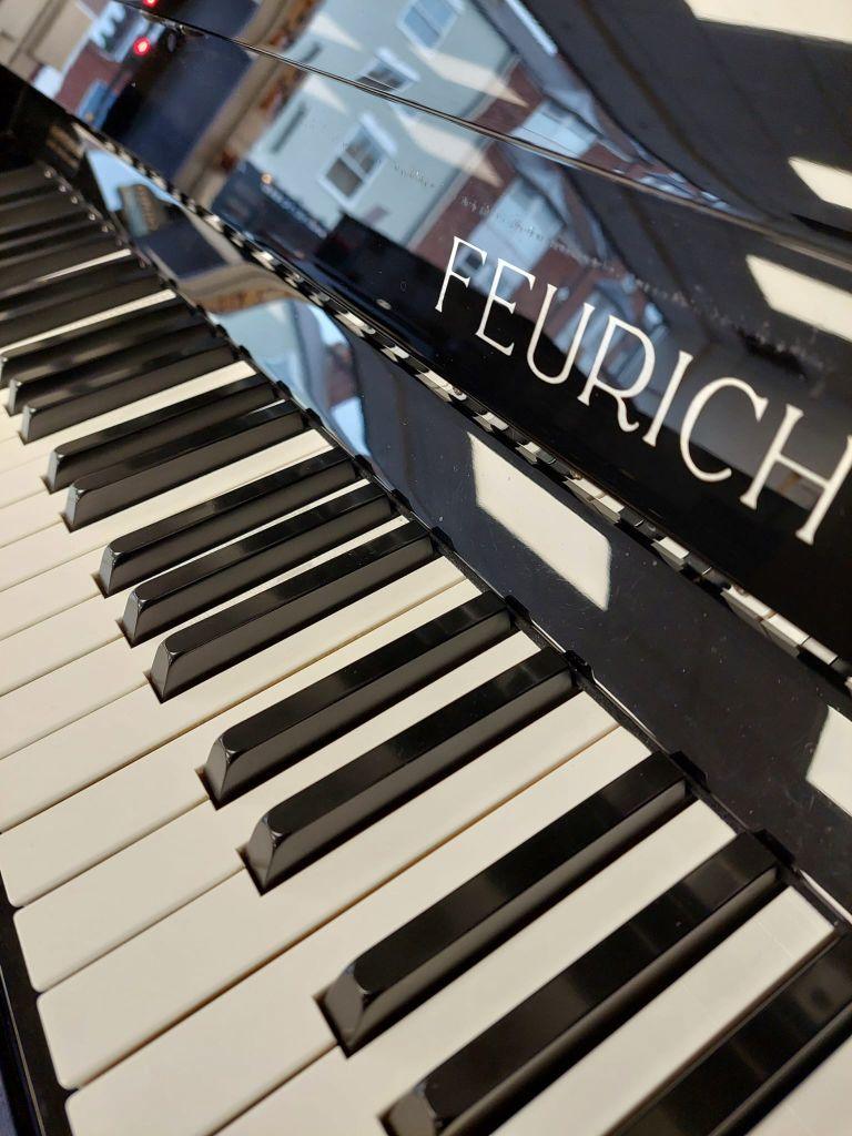 Feurich 122 upright Piano in Black Gloss – Gallery image – Roberts Pianos Oxford