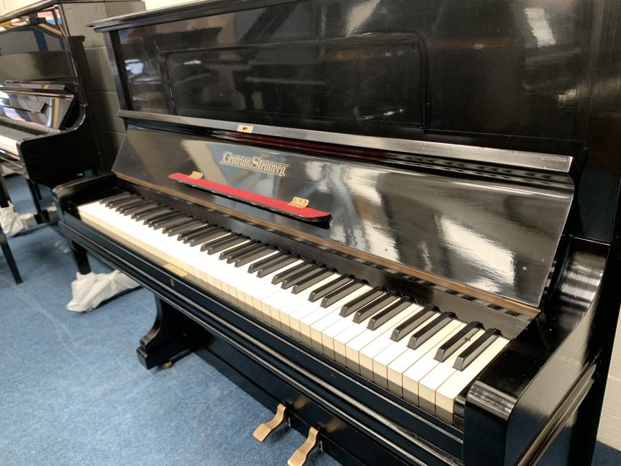 Grotrian Steinweg 120 upright Piano in black – Gallery image – Roberts Pianos Oxford