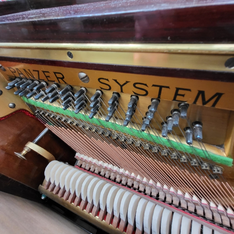 Kaps upright Piano in Walnut – Gallery image – Roberts Pianos Oxford