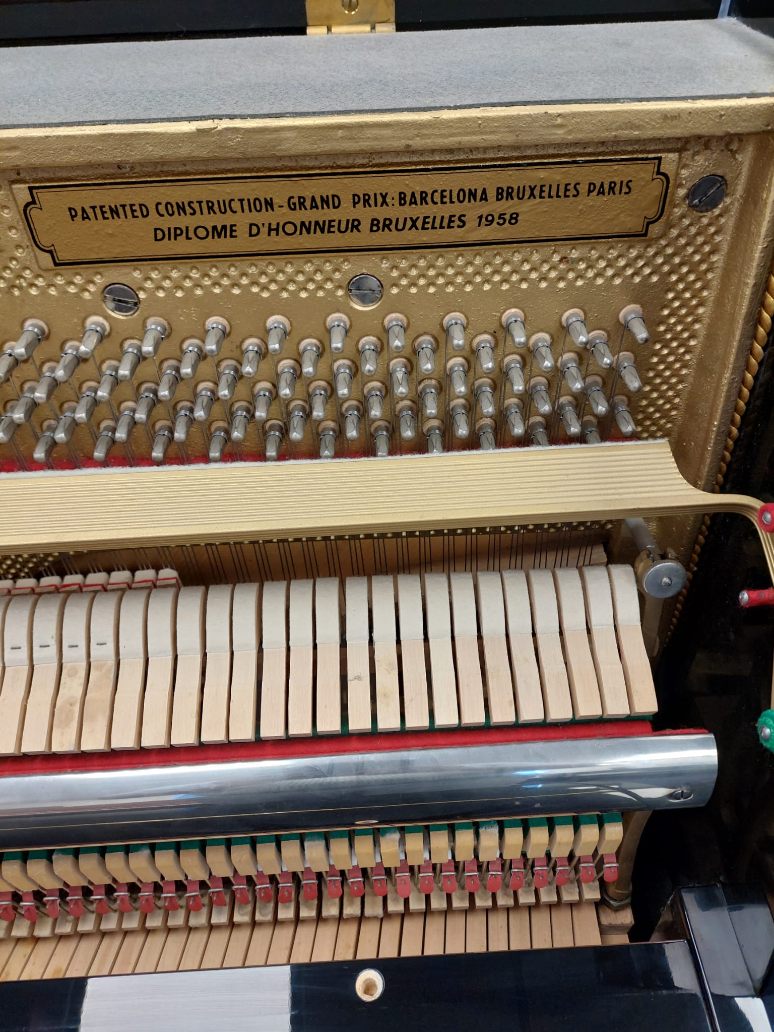 Petrof 116 Upright Piano in Black Polyester – Gallery image – Roberts Pianos Oxford