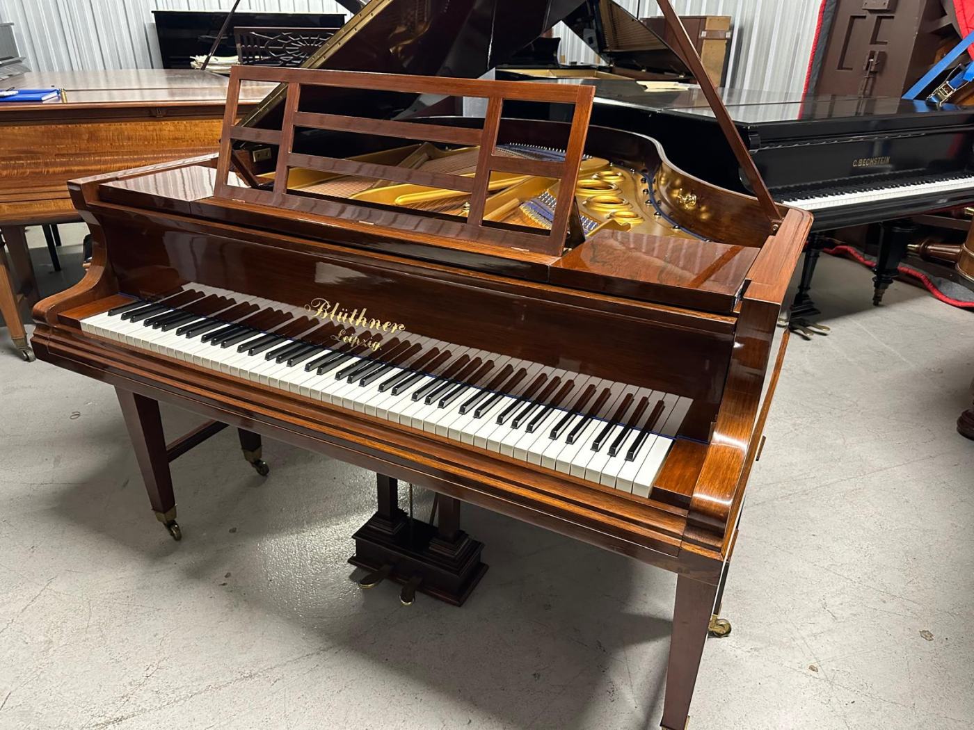 Bluthner style V grand Piano in rosewood – Featured image – Roberts Pianos Oxford