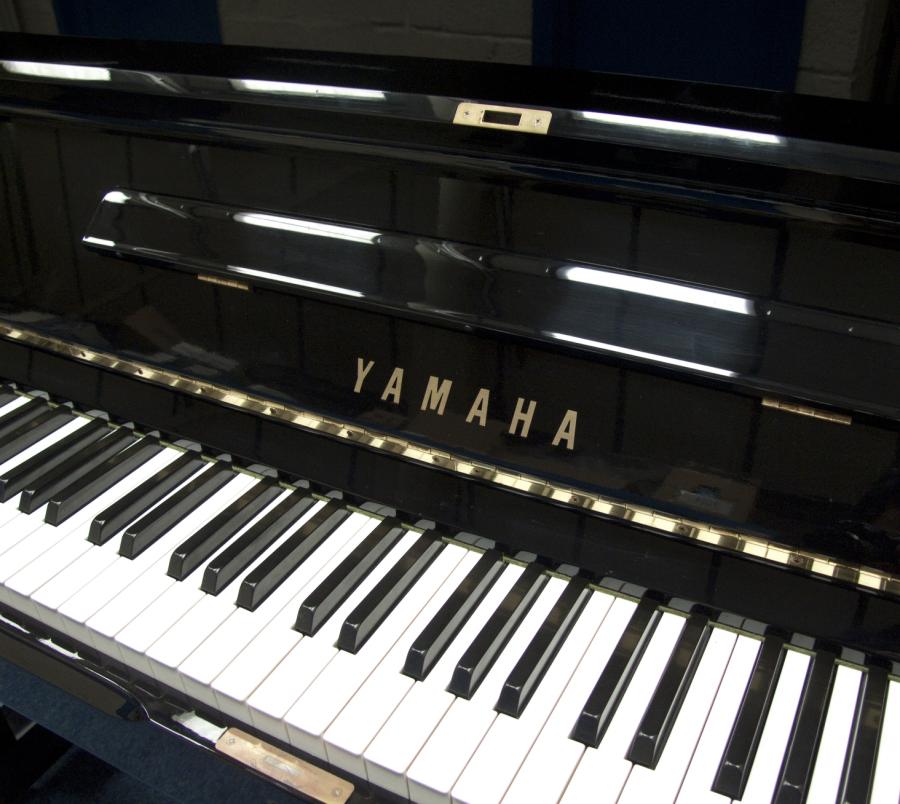 Yamaha X upright Piano in black polyester – Gallery image – Roberts Pianos Oxford