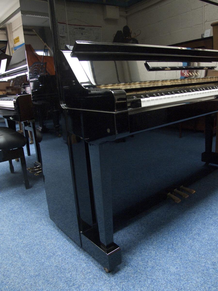 Yamaha X upright Piano in black polyester – Gallery image – Roberts Pianos Oxford