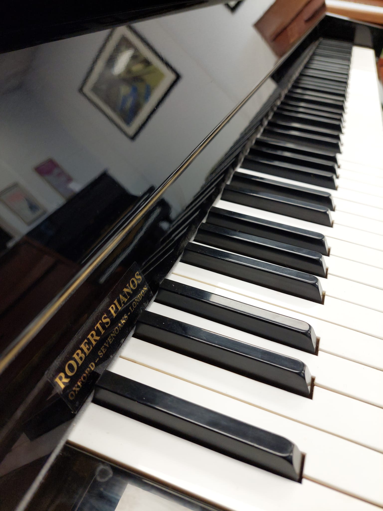 Petrof 116 Upright Piano in Black Polyester – Gallery image – Roberts Pianos Oxford