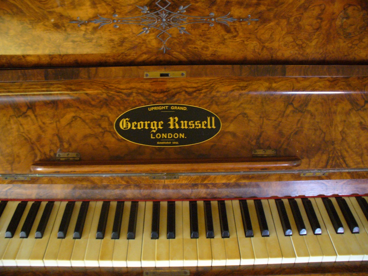Beautifully decorated music desk Russell, George upright