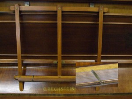 Bechstein bookholder. Not very easy to fit on polyester pianos